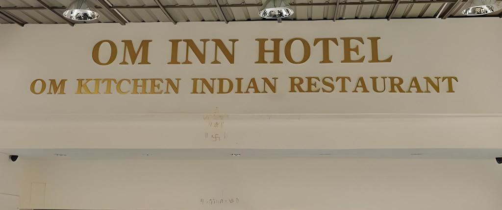 OM INN
