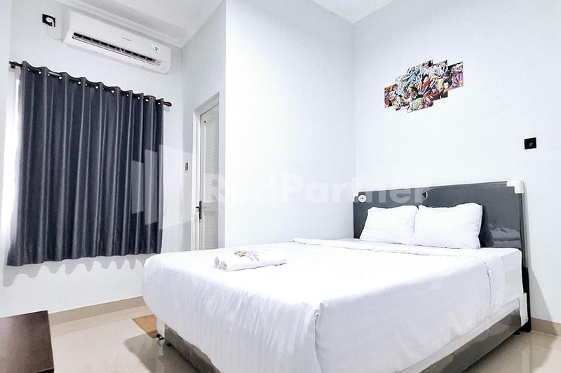 Aster Triplets Guest House JCM Mitra RedDoorz