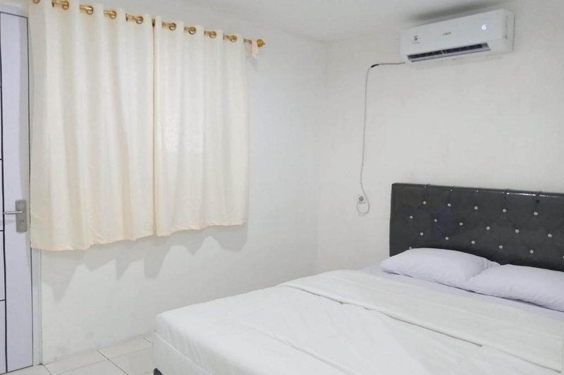 Capital O 93728 Guest House Cemara