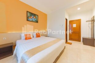 Hotel Alqueby near Kiara Artha Park Mitra RedDoorz