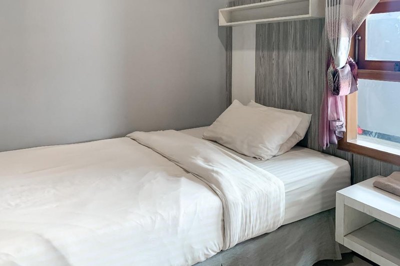 Karins Guesthouse Syariah RedPartner