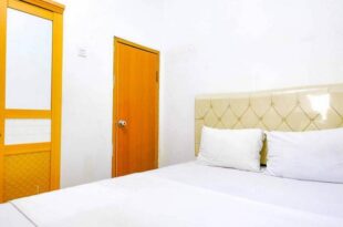 Snow White Residence near Grogol Mitra RedDoorz